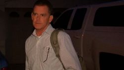 (CNN) -- In the early days of the investigation into the Las Vegas mass shooting, two people were named as persons of interest in the case, according to newly released police search warrants. One was deceased shooter Stephen Paddock's girlfriend, Marilou Danley, who has since been publicly cleared in the case. The name of the other was redacted in hundreds of pages of documents released Tuesday to the media. The Las Vegas Review-Journal has identified that individual as Douglas Haig. Haig did not respond to phone calls Tuesday evening.