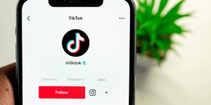 Tiktok app on phone representing corporate security roi example