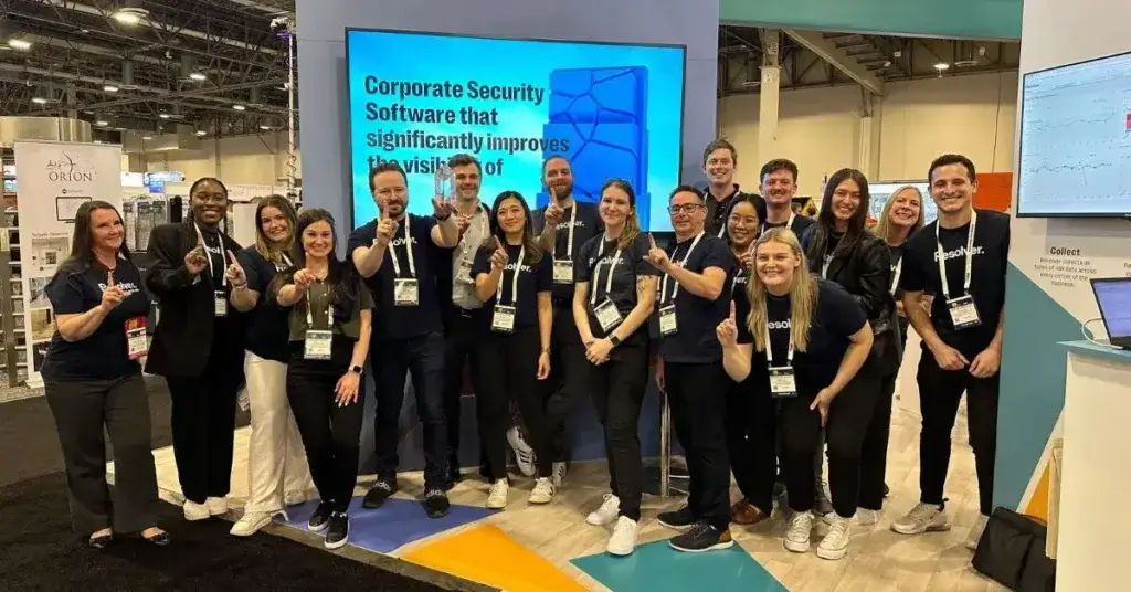 Members of resolver corporate security team at isc west, celebrating their sia awards 2023 win for best new threat/risk management software application